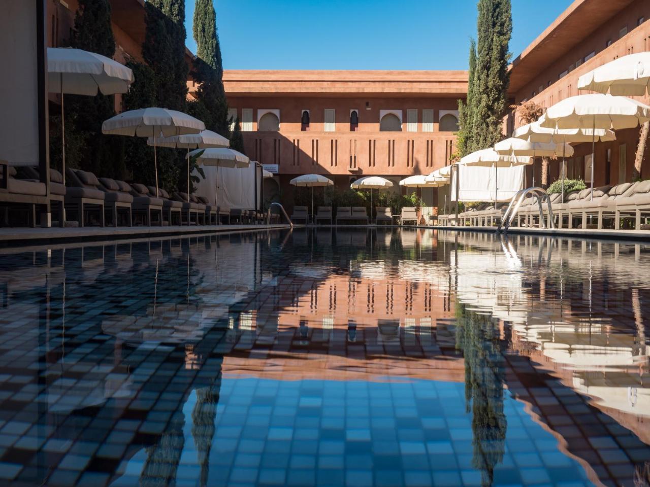 Kenzi Club Agdal Medina Hotel Lahebichate Exterior photo The pool at the Hotel Amanjena